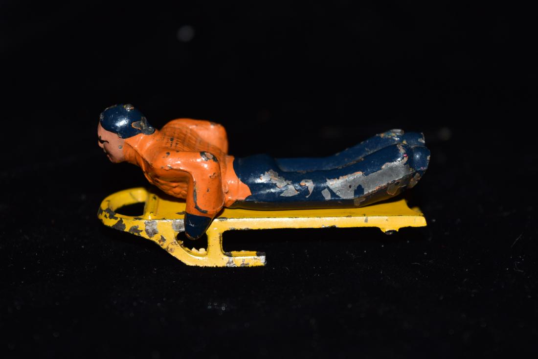 Lead/Tin Man on Sled Toy England Mid/Early 20th Century (1 of 7)