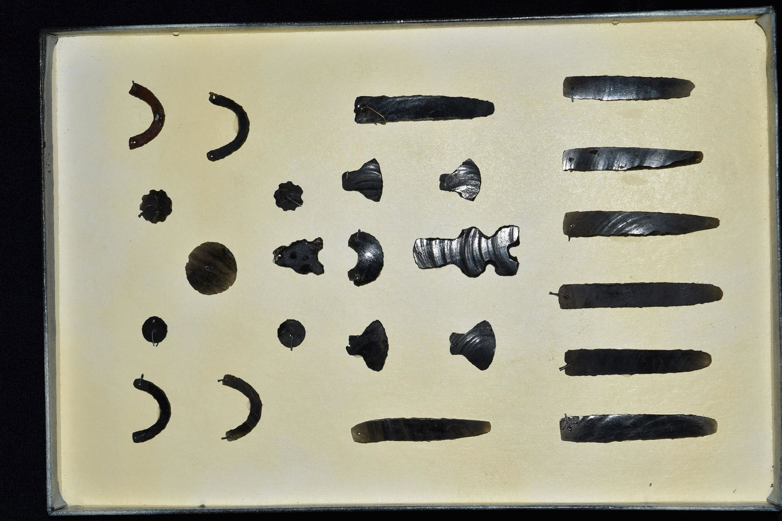 Frame of 24 Obsidian Eccentrics, pre-Columbian, (1 of 2)