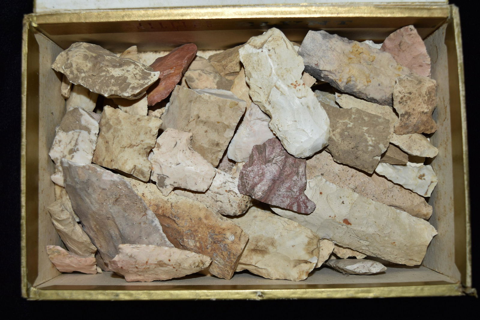 Lot of arrowheads in old cigar box (1 of 2)