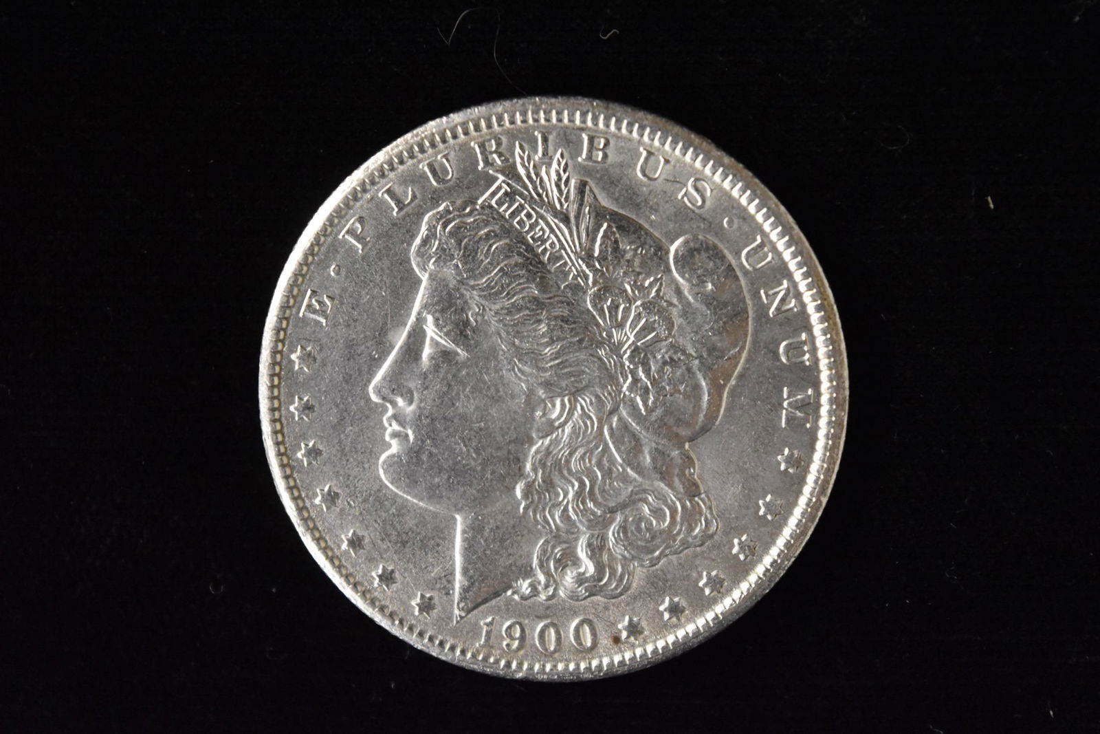 1900 High Grade Morgan Silver Dollar Grade By Picture. (1 of 3)