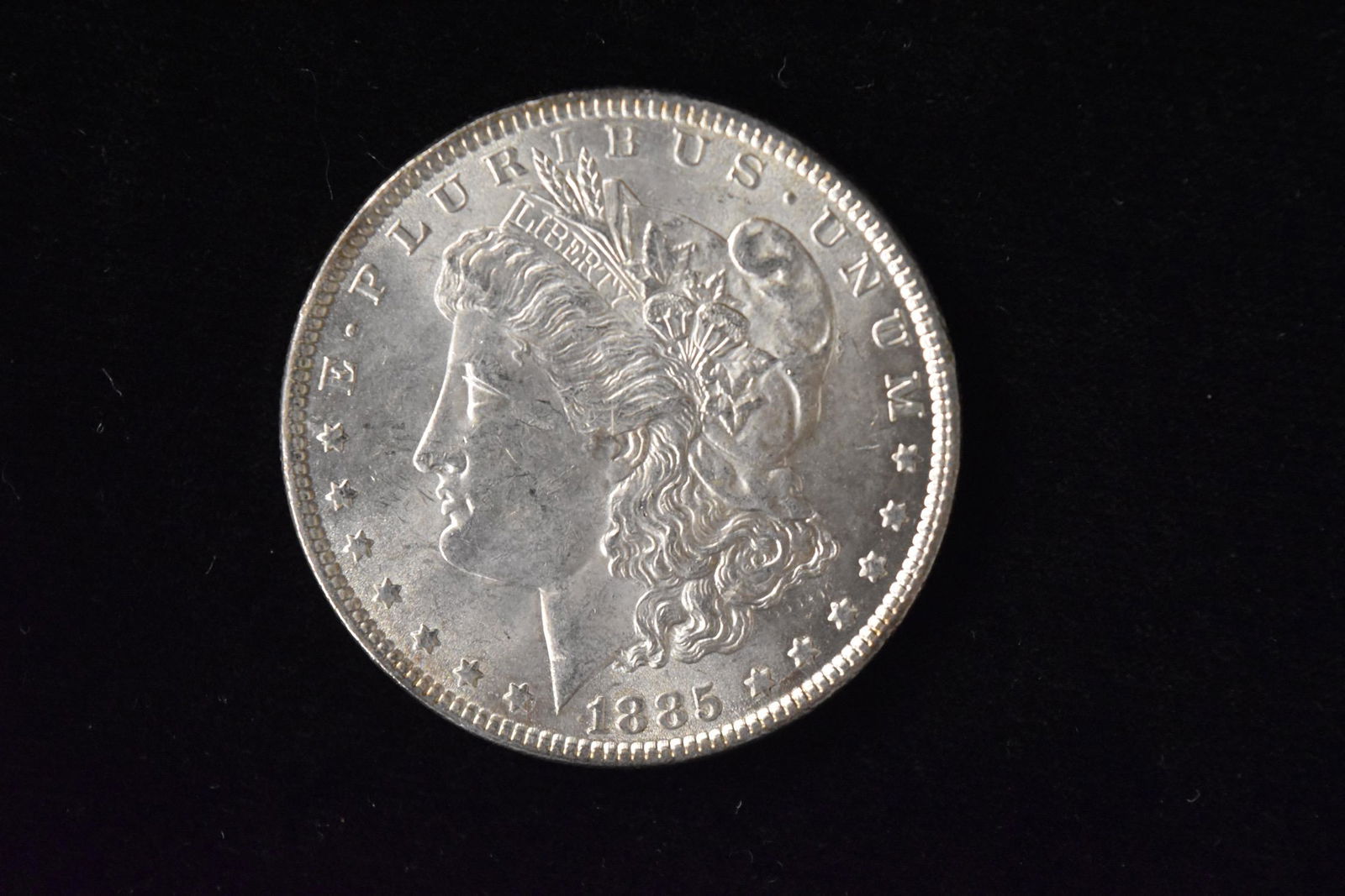 1885 High Grade Morgan Silver Dollar Grade By Picture. (1 of 3)