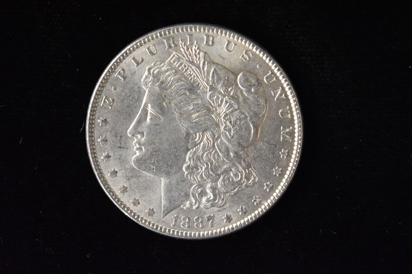 1887 High Grade Morgan Silver Dollar Grade By Picture. (1 of 3)