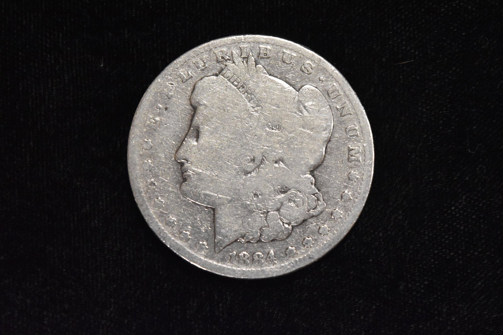 1884, Silver Dollar, Grade by Picture (1 of 3)
