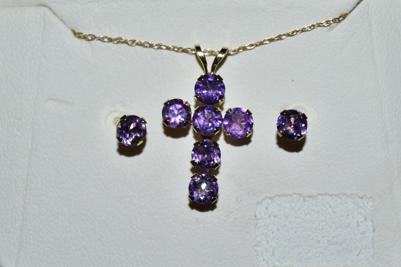 2 ct. amethyst stud earrings and cross. 14k gold: 2 ct. amethyst stud earrings and cross. 14k gold