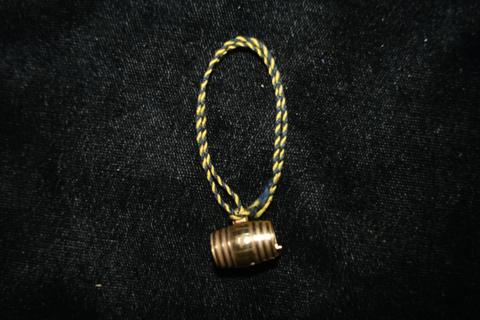 Miniature Brass Barrel advertising Seagram's on one: Miniature Brass Barrel advertising Seagram's on one side and Ancient Bottle Gin on other. Measures 5/8" tall