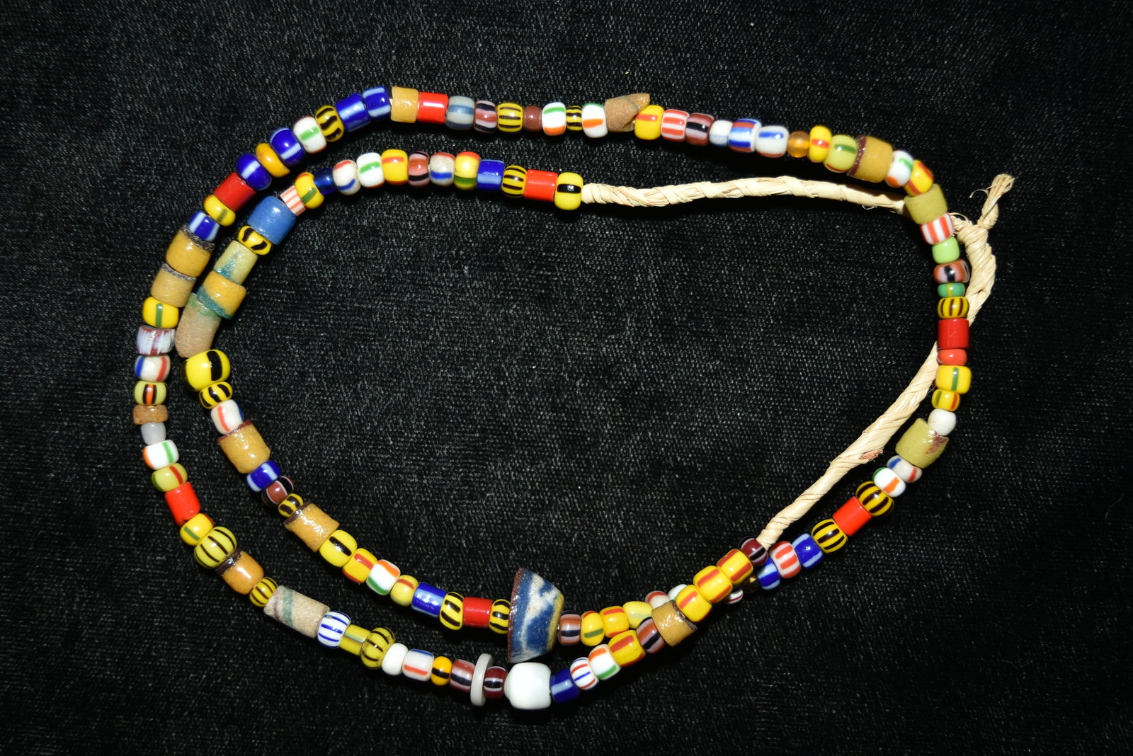 One strand of fancy multi colored art glass Venetian: One strand of fancy multi colored art glass Venetian beads. 3 to 6 mm. 21" total length
