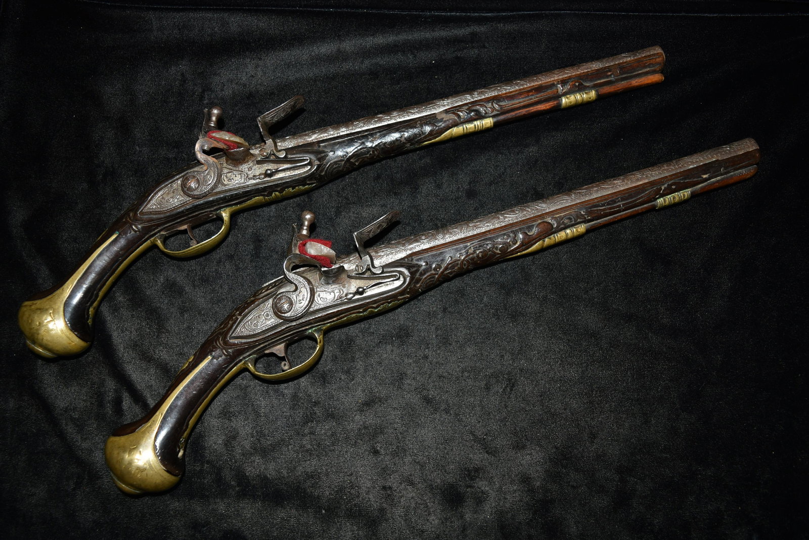 Spectacular Pair of Holster Dueling Pistols, Spanish: Spectacular Pair of Holster Dueling Pistols, Spanish Colonial Chisel Engraved Portraits of Conquistador, Aztecs, Flora Fauna, and Crocodiles