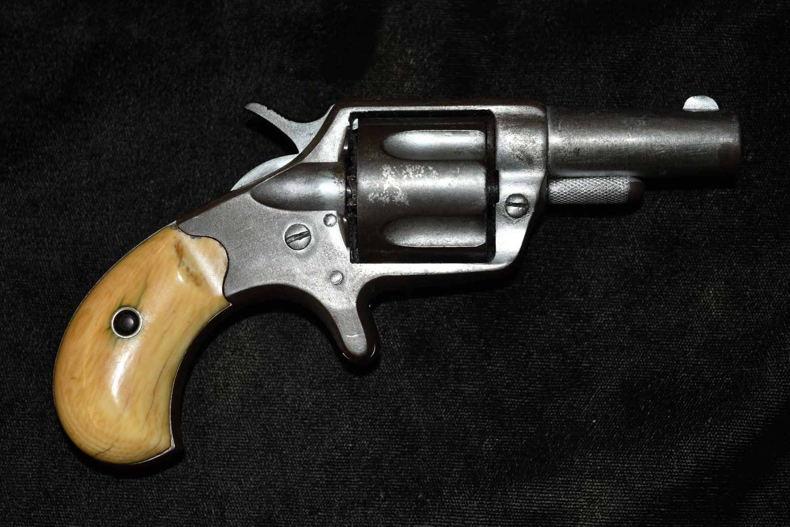 Antique Colt New Line 41 Revolver, Serial #77,: Antique Colt New Line 41 Revolver, Serial #77, Manufacturer: Colt. Model: New Line Revolver. Gauge: 41 RF. Barrel: 2 1/4" Round. Finish: Nickel. Antique New Line Revolver. In good as found original co