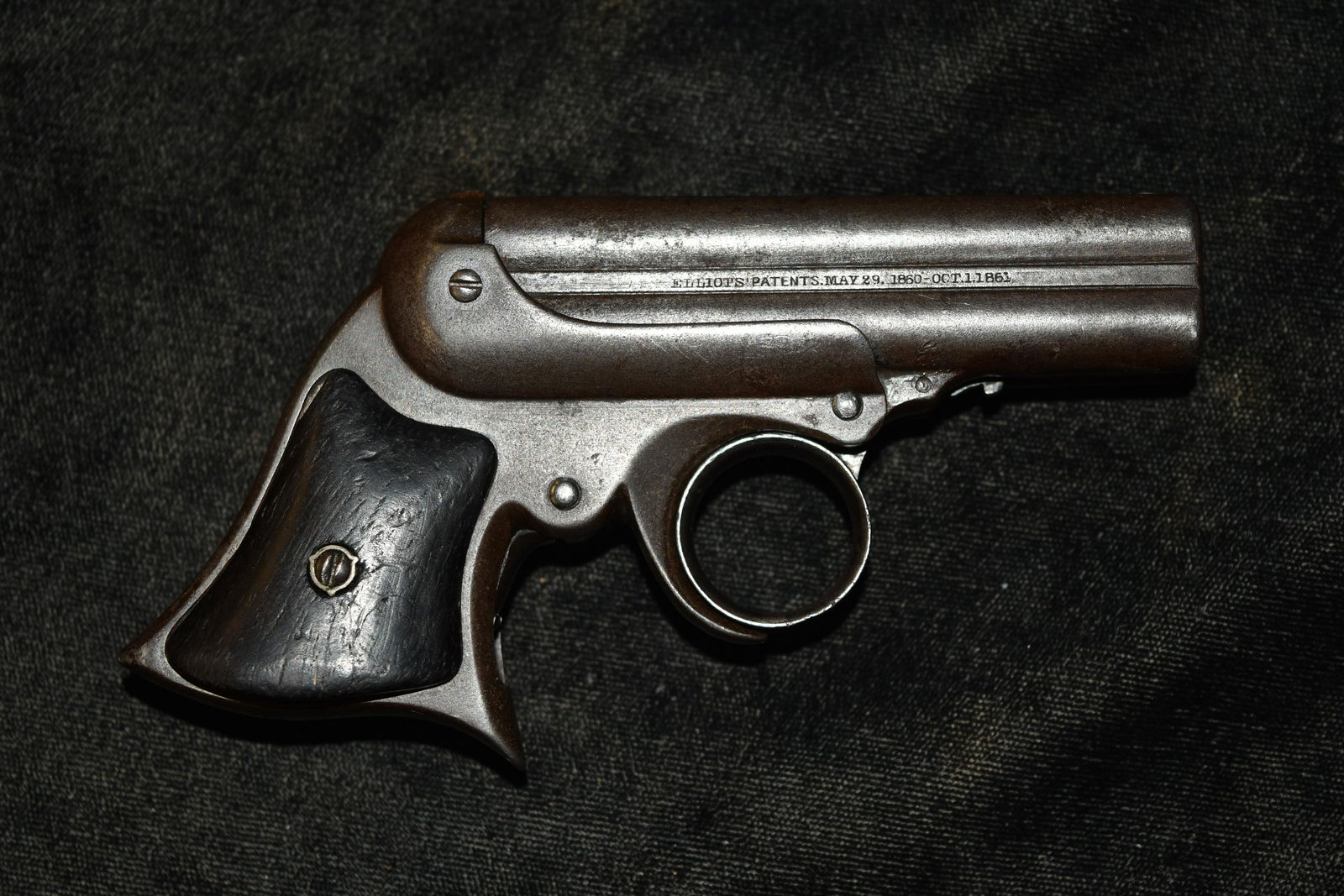 Antique Remington Elliot Four Barrel Pepperbox: Antique Remington Elliot Four Barrel Pepperbox Derringer, Serial #9792. Manufacturer: Remington Arms Inc. Model: Ring Trigger. Pistol Gauge: 32 RF, 3 1/4" Solid Rib. Finish Blue. Grip is rosewood. Cla