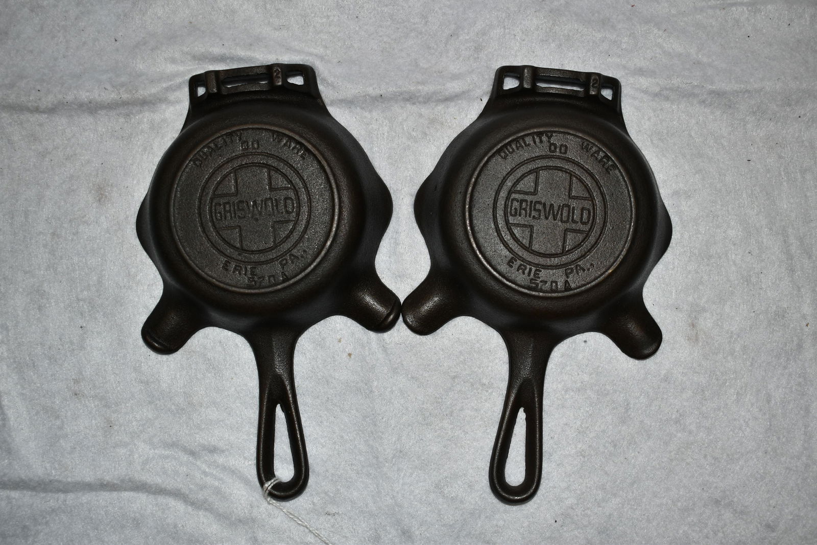 Lot of 2 Cast Iron Griswold Ashtray with Advertising In (1 of 7)