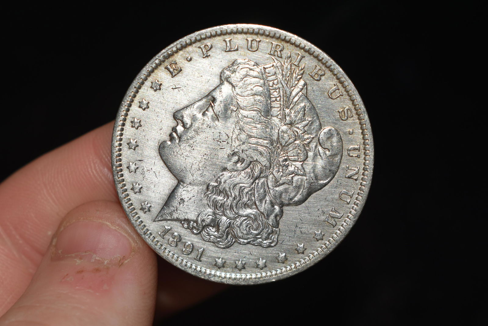 High grade 1891o  Morgan Silver Dollar.  Please grade (1 of 3)