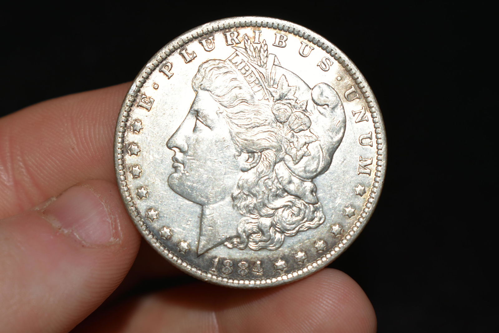 High grade 1884o Morgan silver dollar. Please use (1 of 2)