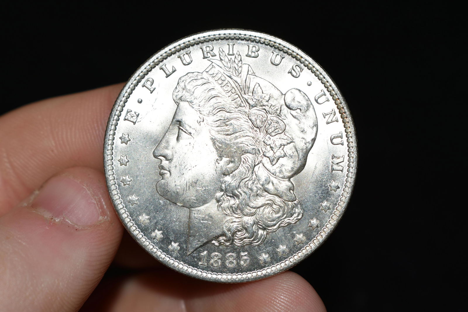 High grade 1885o Morgan silver dollar. Please use (1 of 2)