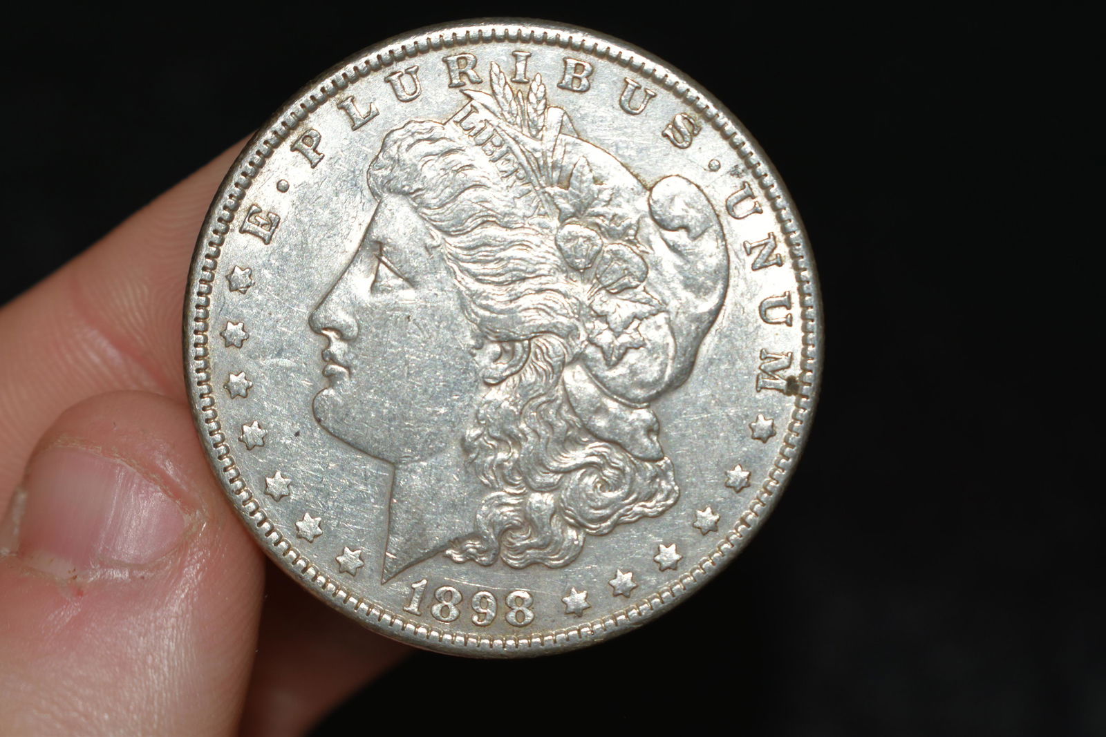 High grade 1898 Morgan silver dollar. Please use (1 of 2)