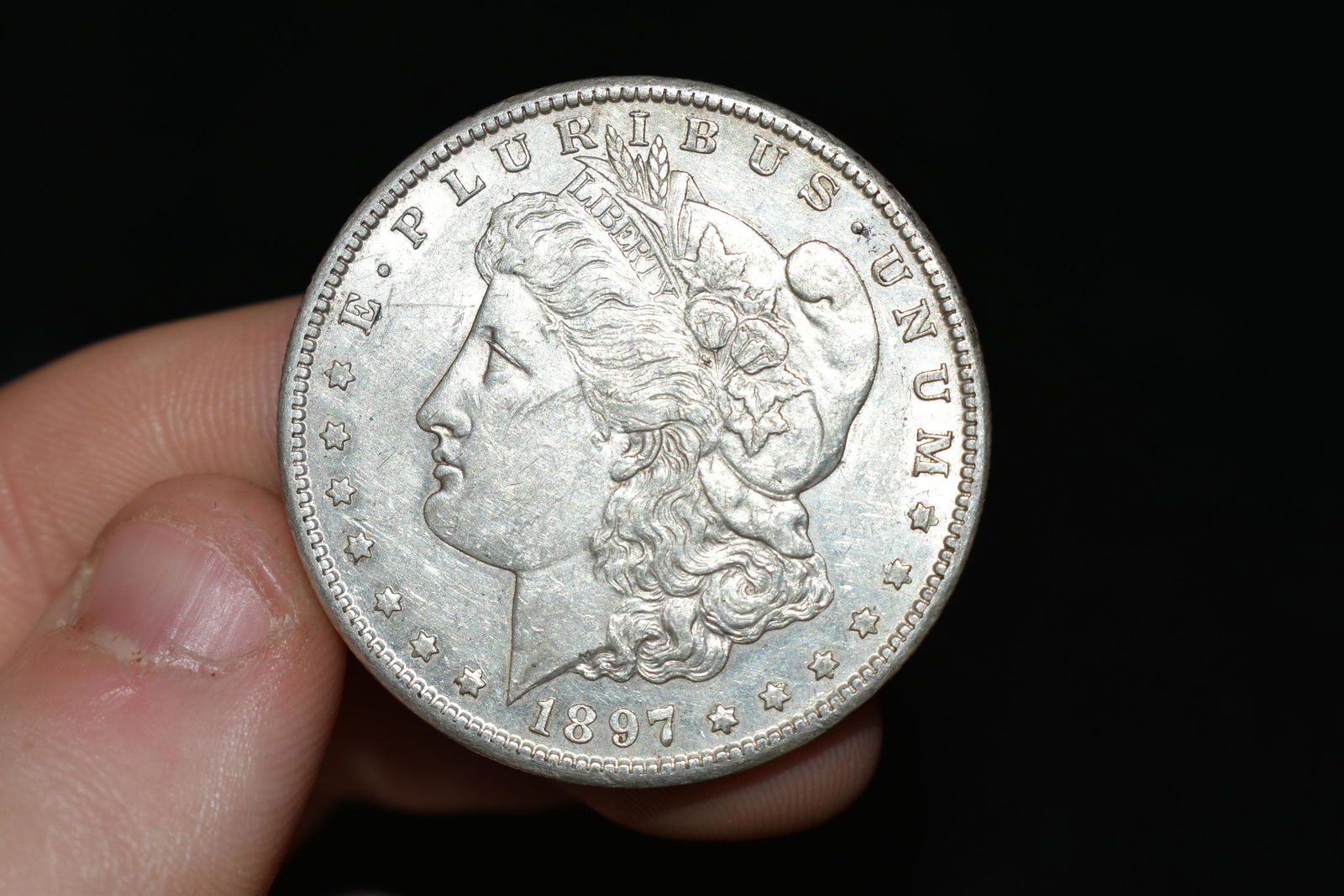 High grade 1897s Morgan silver dollar. Please use (1 of 2)