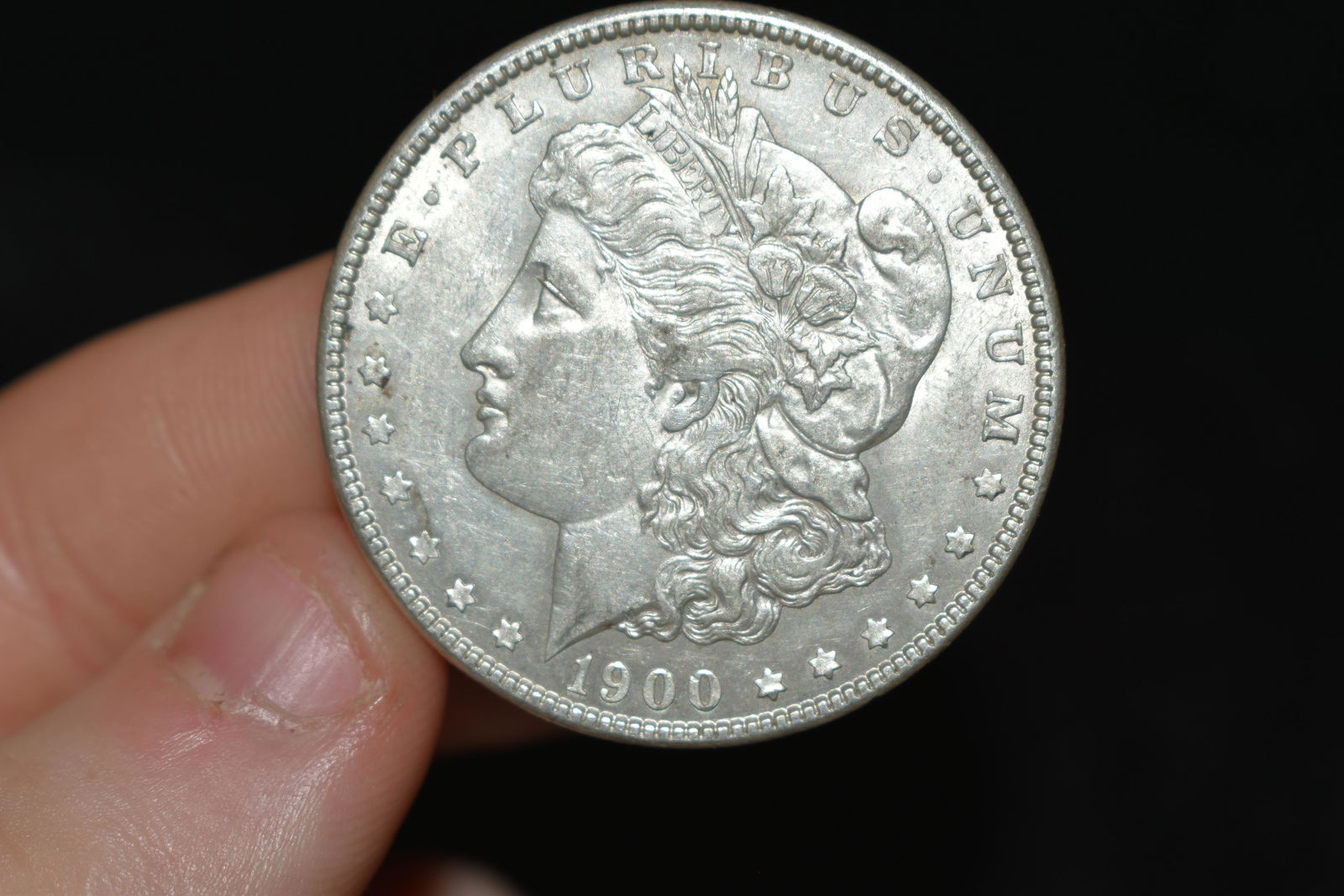 High grade 1900 Morgan silver dollar. Please use (1 of 2)