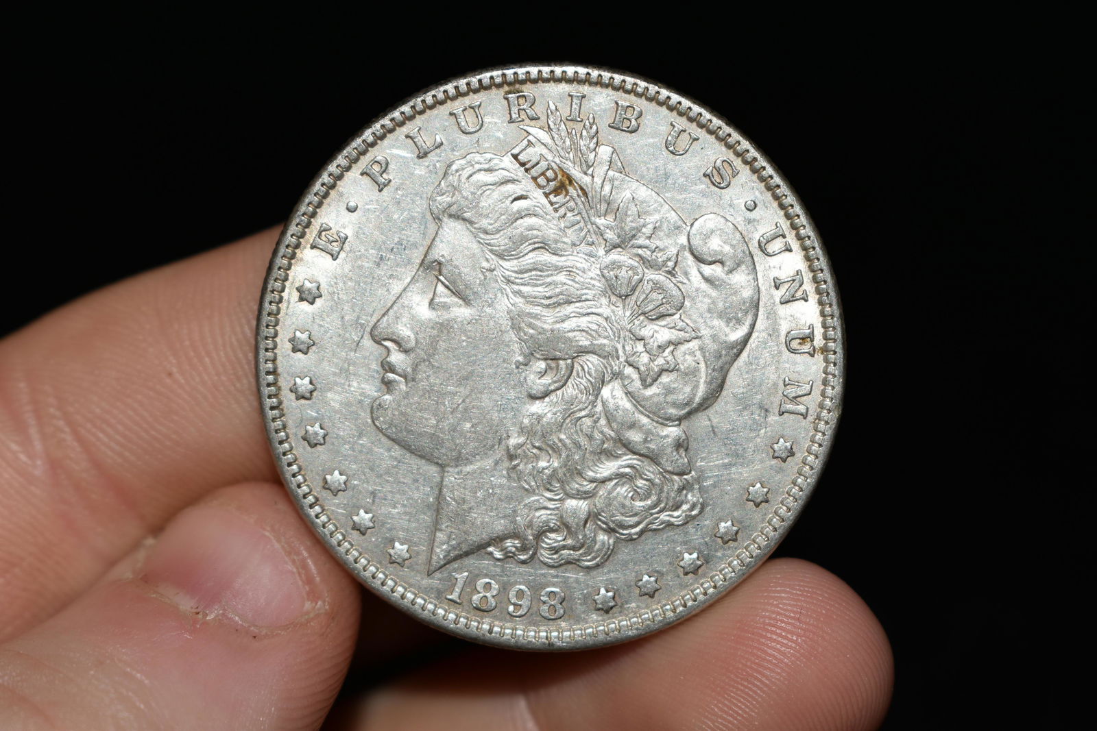 High grade 1898 Morgan silver dollar. Please use (1 of 2)