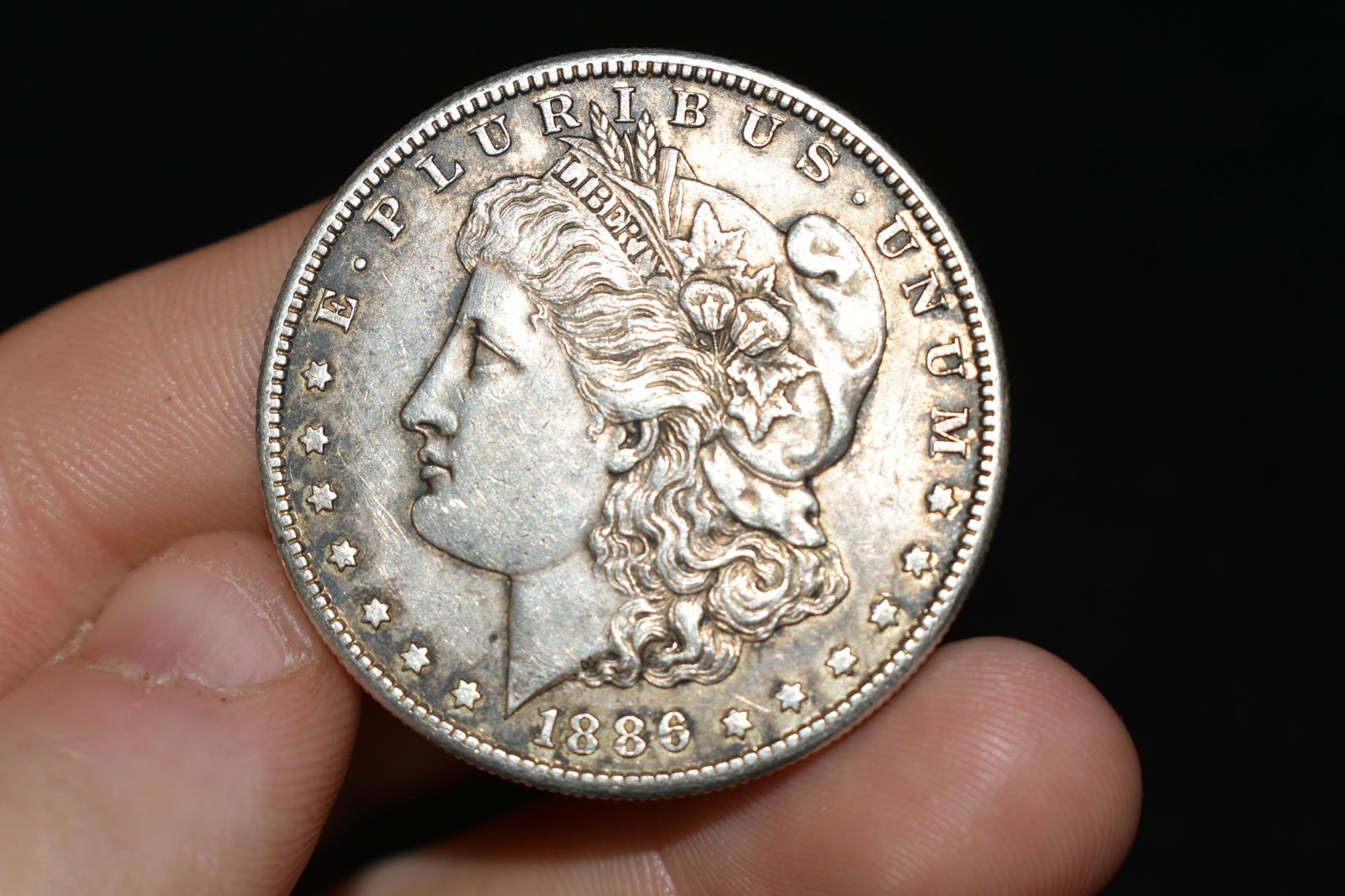 High grade 1886s Morgan silver dollar. Please use (1 of 2)