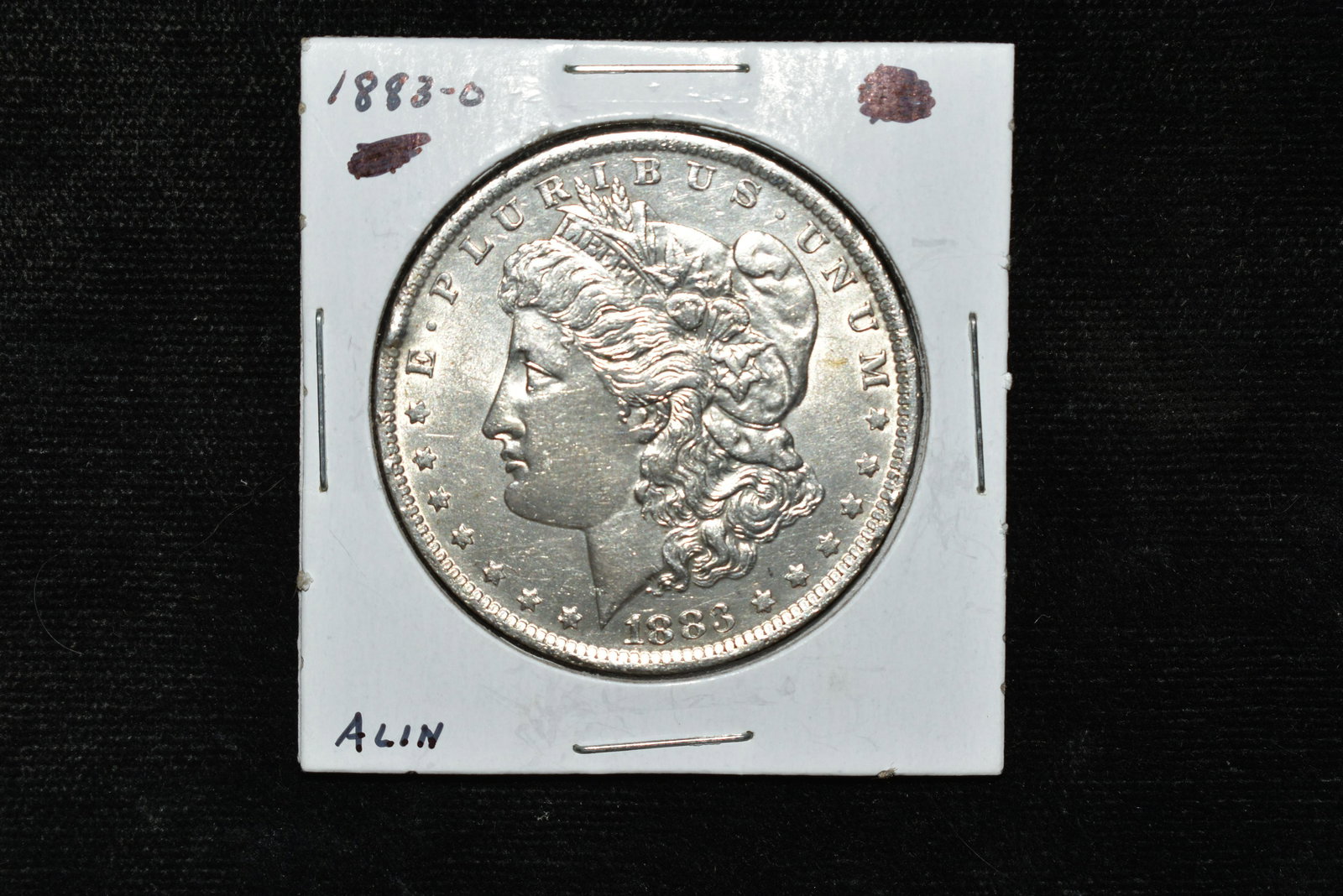 High grade 1883 O Morgan dollar. Please use photo for: High grade 1883 O Morgan dollar. Please use photo for grading