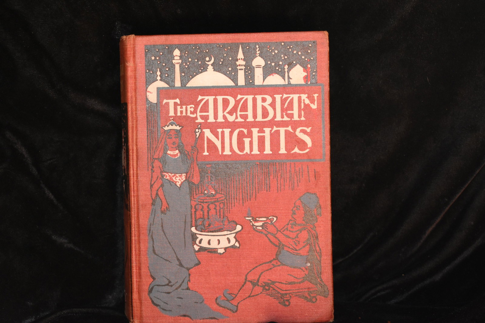 THE ARABIAN NIGHTS ENTERTAINMENTS circa 1900: THE ARABIAN NIGHTS ENTERTAINMENTS circa 1900. Published by W. B. Conkey, Chicago. Illustrated Hardback in Red cloth. In Color Infront piece with many Illustrations throughout the book. Good Shape for 