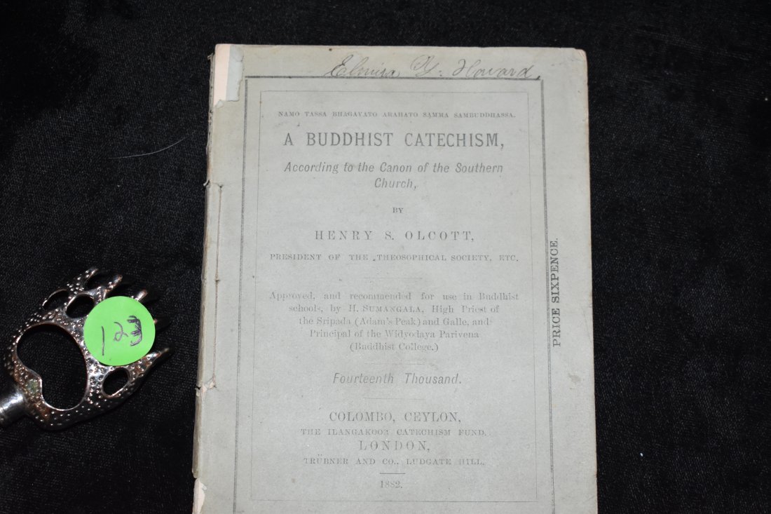 1882 A BUDDHIST CATECHISM by Henry S. Olcott: 1882 A BUDDHIST CATECHISM by Henry S. Olcott (President of the Theosophical Society). Published by Trubner and Co London. Fourteenth Thousand copy. 57 pages 5 1/2 by 4 1/8" Paperback. Some fraying aro