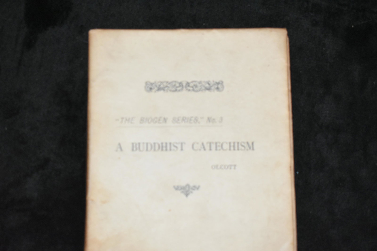 1885 A BUDDHIST CATECHISM by Henry S. Olcott: 1885 A BUDDHIST CATECHISM by Henry S. Olcott (President of the Theosophical Society). Published by Trubner and Co London. This edition was a part of the Biogen Series "No 3". 84 pgs 6" by 5 1/8". Pape