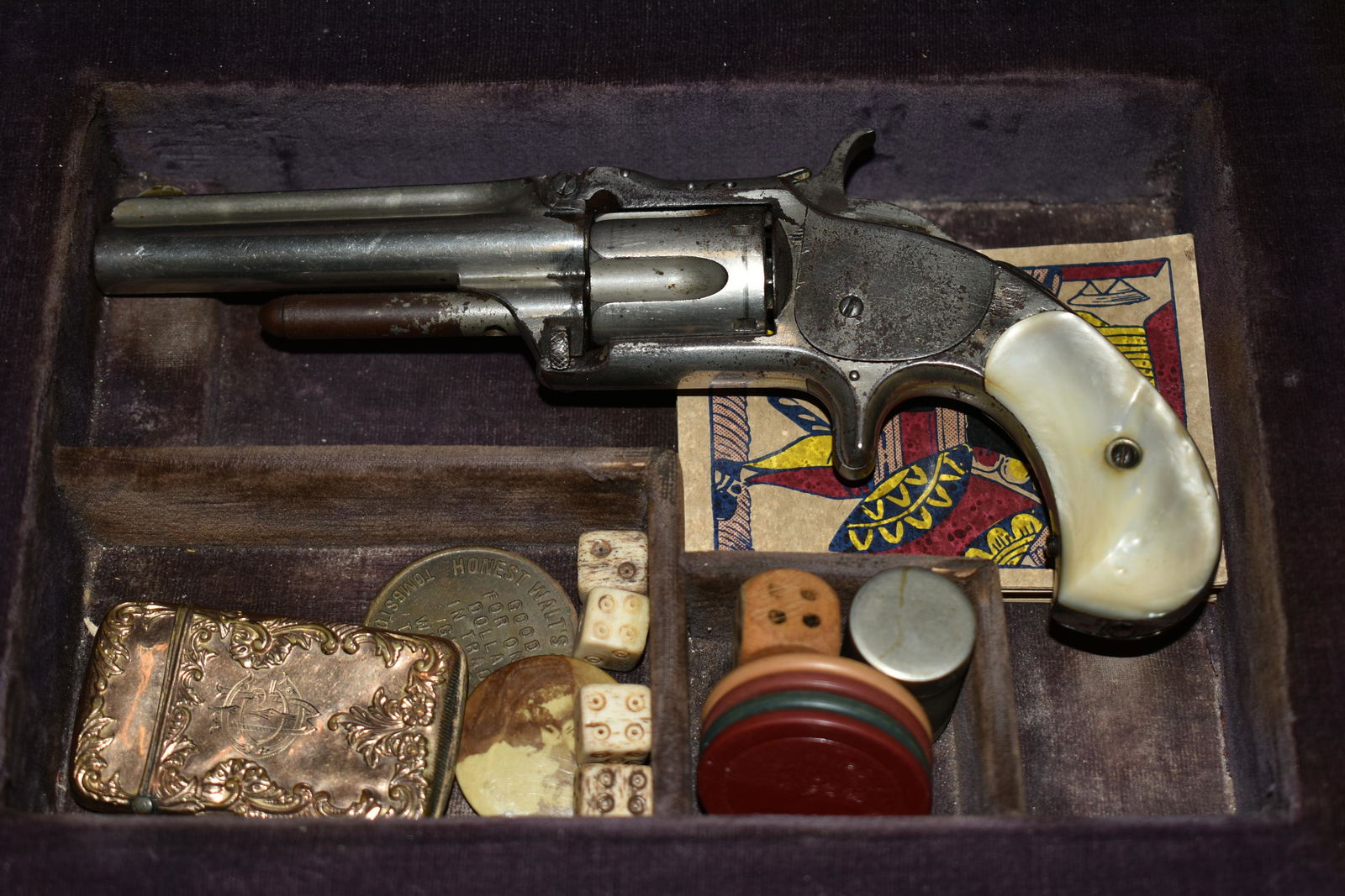 Antique Gambler Photo Album Gun Box containing Smith: Antique Gambler Photo Album Gun Box containing Smith and Wesson Pistol, Deck of Cards, Dice, Poker Chips and Lighter