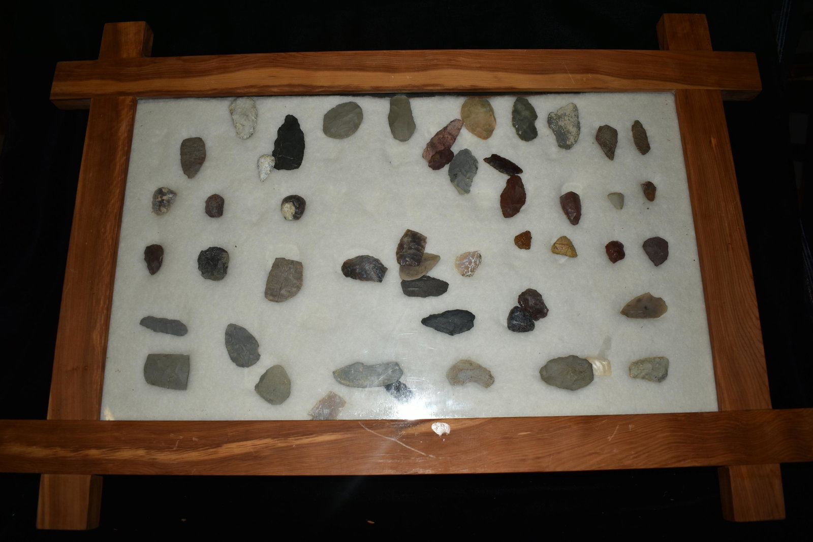 32" x 22" Frame, Contains Approx. 51 Scrapers/Blades,: 32" x 22" Frame, Contains Approx. 51 Scrapers/Blades, Musselshell, Montana where he found his first arrowhead at a very early age. This led Creel on a lifetime search for Montana's prehistoric past. C