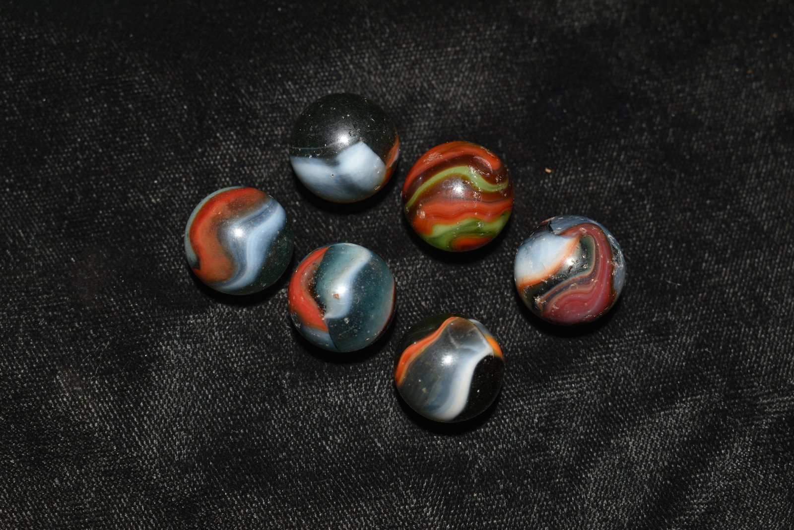 6 Superior Rainbow Peltier's: 6 Superior Rainbow Peltier's 6 Tri-color Rainbow Peltier's from the 1920's. One has 4 colors! All have a few hit marks from when kids actually played with them but are still in very good to excellent 