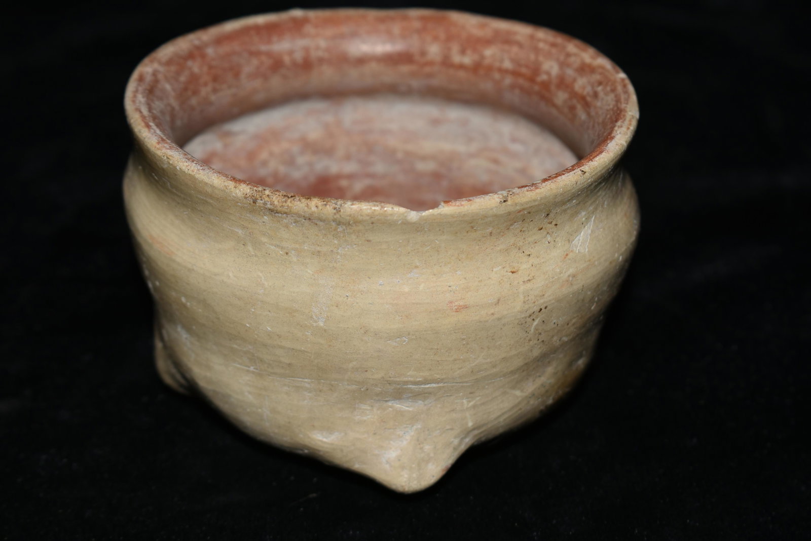 An excellent Mixtec-Aztec tetrapod bowl from Mexico,: An excellent Mixtec-Aztec tetrapod bowl from Mexico, ca. 1200 â€“ 1500 AD. It is 3-7/8” in diameter and is painted with a highly burnished cream slip on the exterior. The interior is blood 