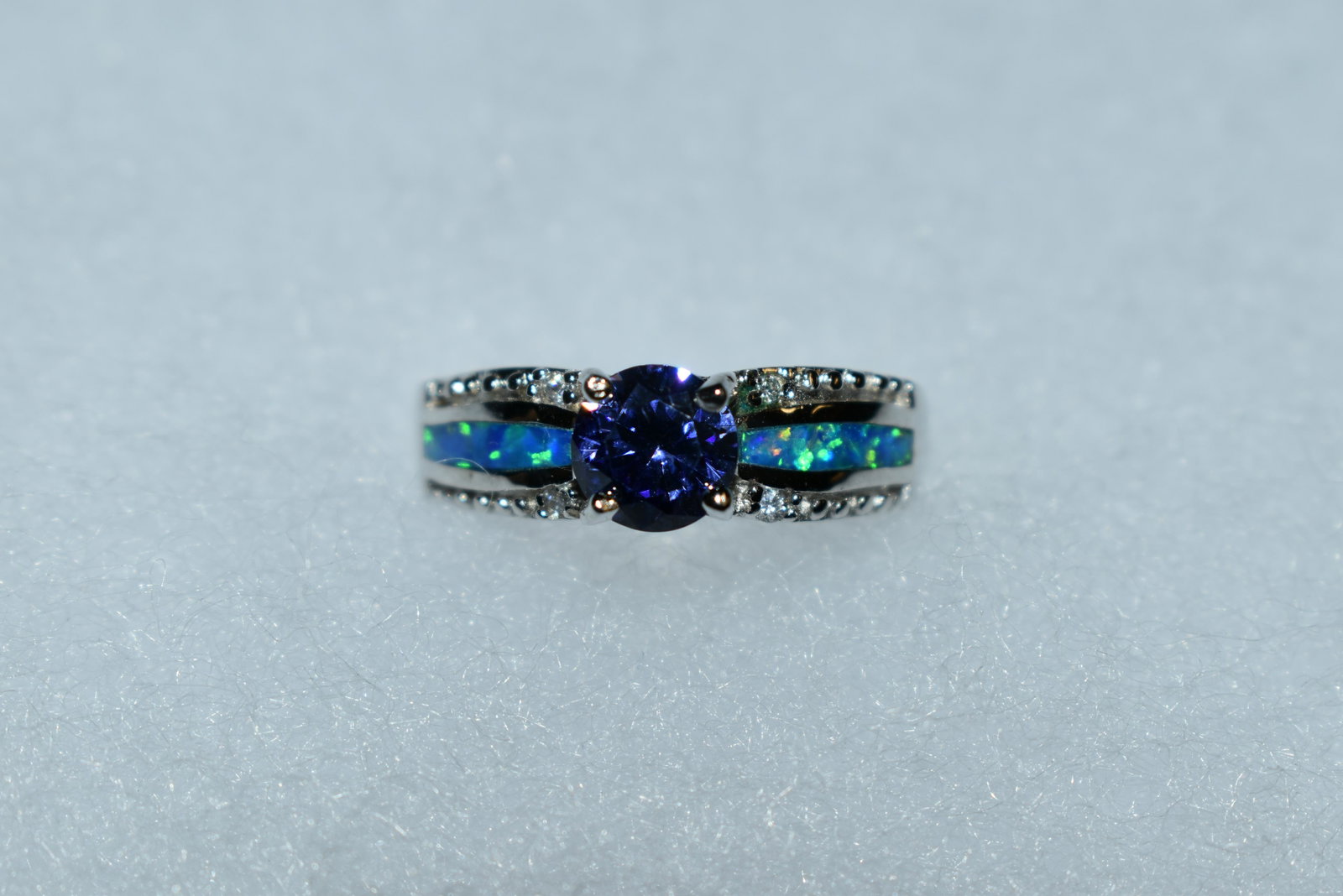 Beautiful tanzanite and blue opal sterling silver ring.: Beautiful tanzanite and blue opal sterling silver ring. Lab created tanzanite. Size 9 3/4.