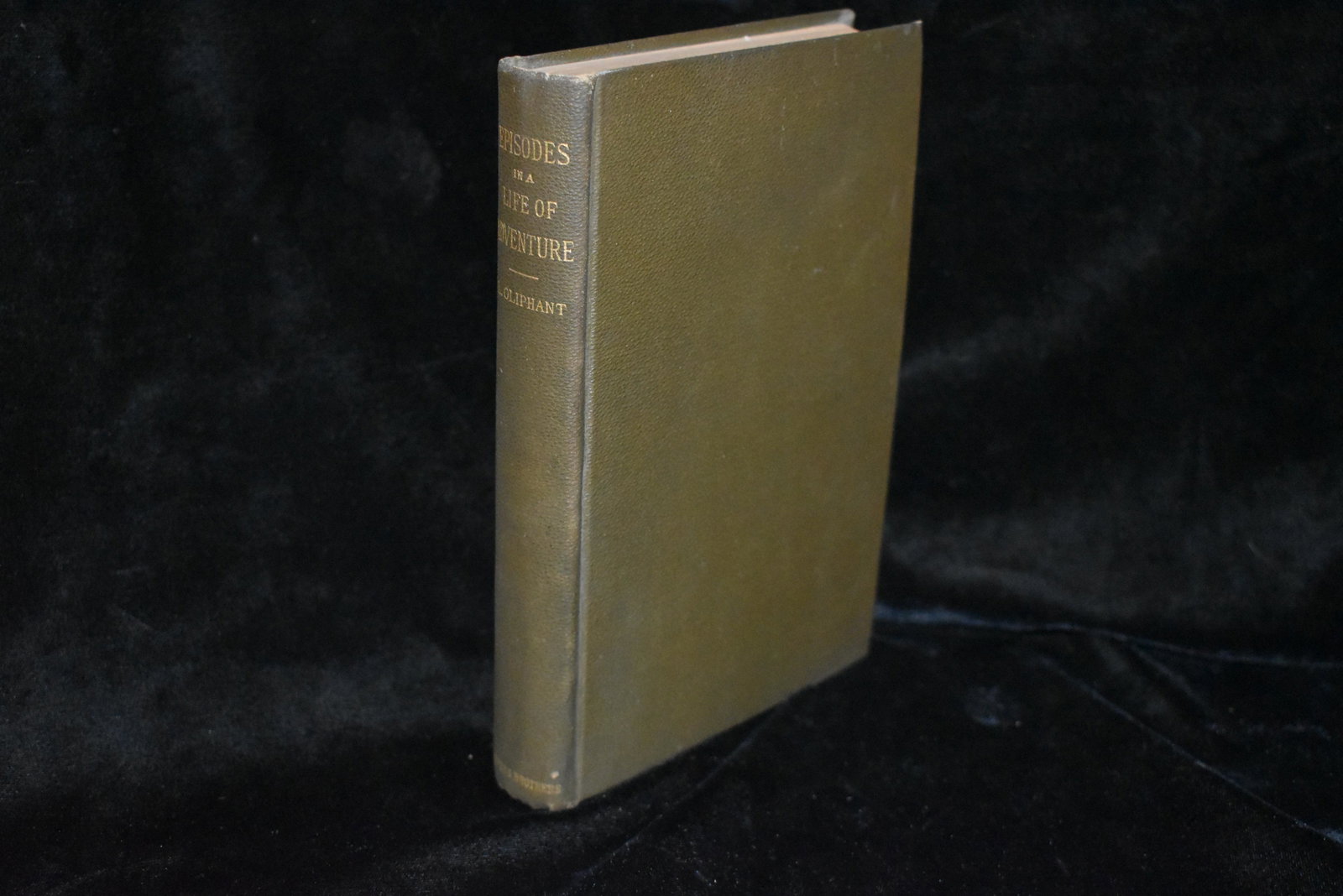 1887 Episodes in a Life of Adventure 1st Ed: Episodes in a Life of Adventure or Moss from a Rolling Stone Laurence Oliphant. Published by Harper & Brothers, New York (1887). 1st Edition. Publishers original brown cloth hardback with gold gilt to