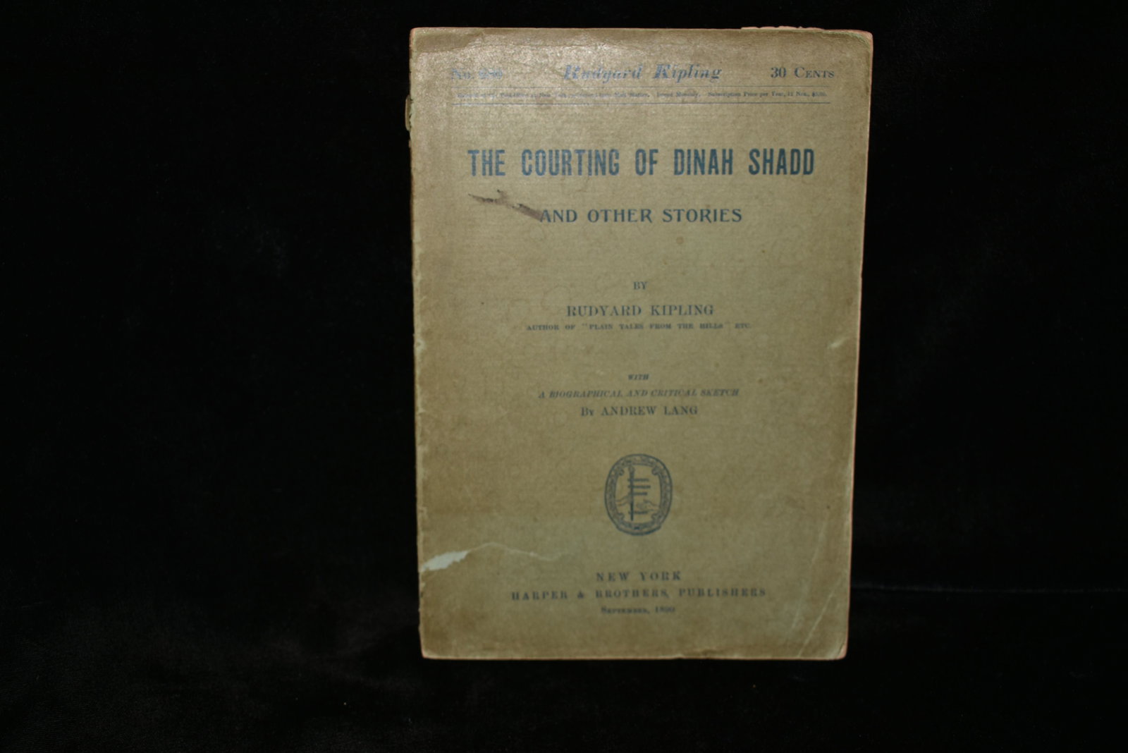 1890 The Courting of Dinah Shadd 1st Ed: The Courting of Dinah Shadd And Other Stories by Rudyard Kipling. Published by Harper and Brothers, New York (1890). 1st U.S. Edition. Very Good condition for a 120 year old paperback. Front cover is 