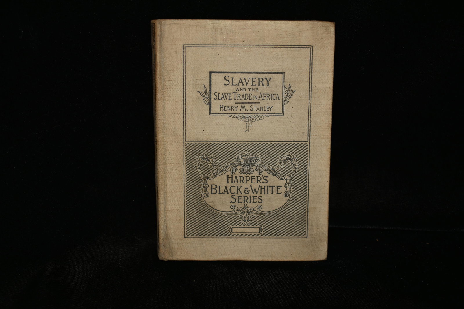1893 Slavery and the Slave Trade in Africa 1st Ed: Slavery and the Slave Trade in Africa by Henry M.Stanley. Published by Harper & Bros, New York (1893). 1st Edition. Publishers original tan cloth hardback with black gilt/print. Very Good + Condition.