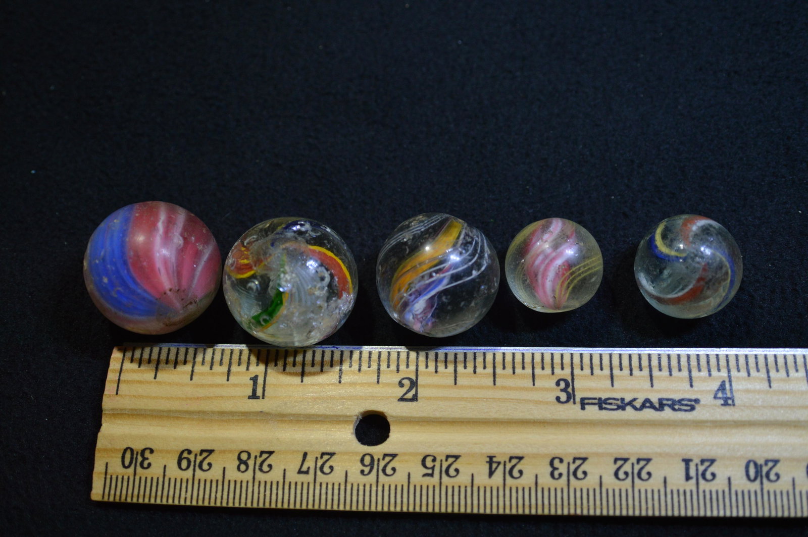 5 Highly Collectible Marbles. Some are solid Core.: 5 Highly Collectible Marbles. Some are solid Core. All have been played with a lot.