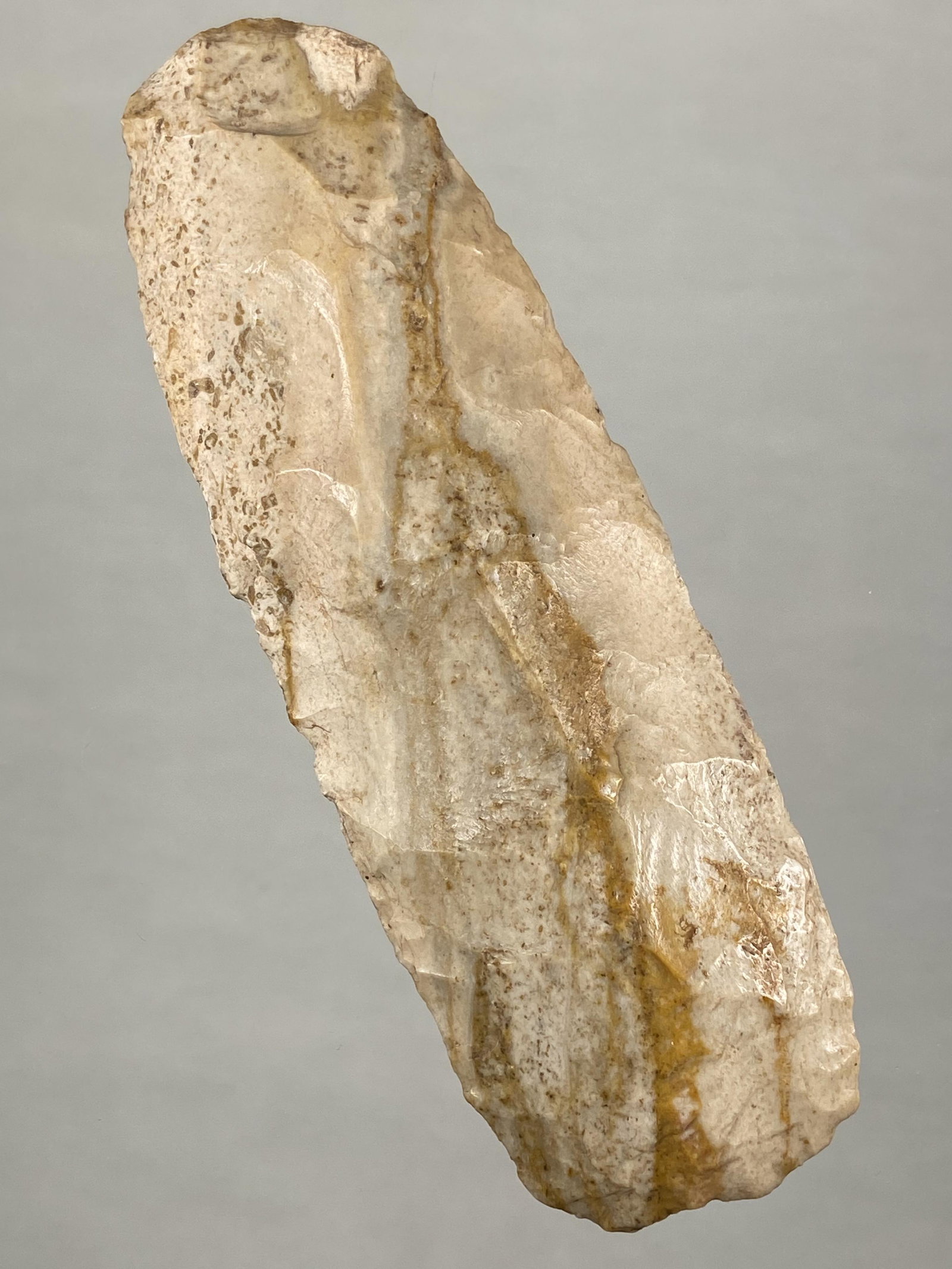 5 1/8" WELL POLISHED COLORFUL FLINT CELT FOUND IN: 5 1/8" WELL POLISHED COLORFUL FLINT CELT FOUND IN DEWITT MISSOURI, CARROLL COUNTY, INDIAN ARTIFACT