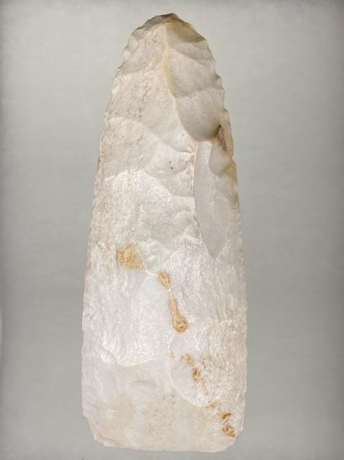 9" LONG KAOLIN POLISHED FLINT ADZE FOUND IN ST LOUIS: 9" LONG KAOLIN POLISHED FLINT ADZE FOUND IN ST LOUIS COUNTY MISSOURI, EX BEN THOMPSON COLLECTION, EX STAN EDWARDS, PICTURED IN WHO'S WHO #5 PAGE 274; WHO'S WHO #5 PAGE 296; WHOS WHO #6 PAGE 16
