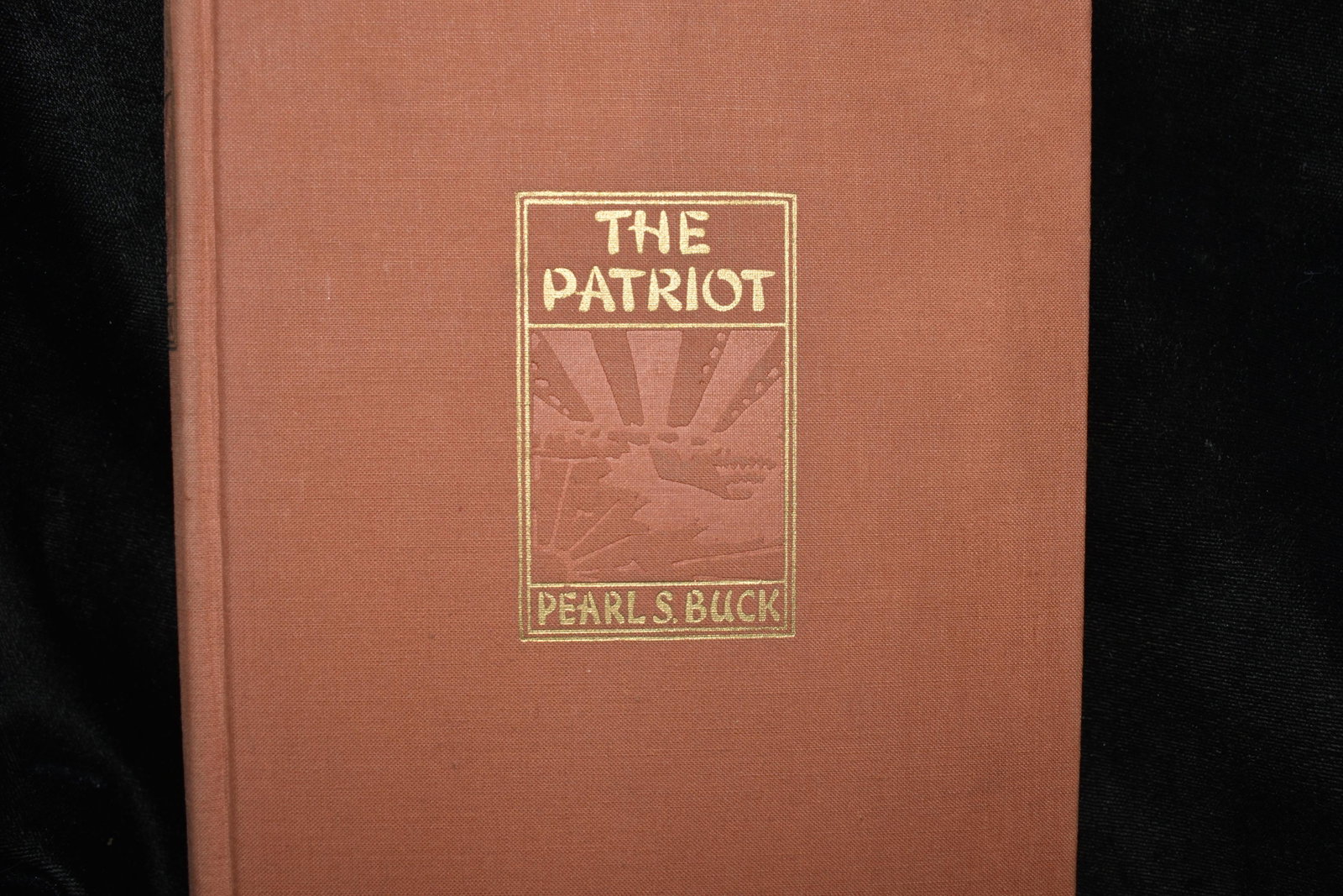 1939 The Patriot 1st Edition: The Patriot by Pearl S. Buck. New York : The John Day Company 1939. Very Good condition. Publishers original peach cloth hardback with gold gilt to cover and spine. 372 pgs. 8 3/8" by 5 1/4"