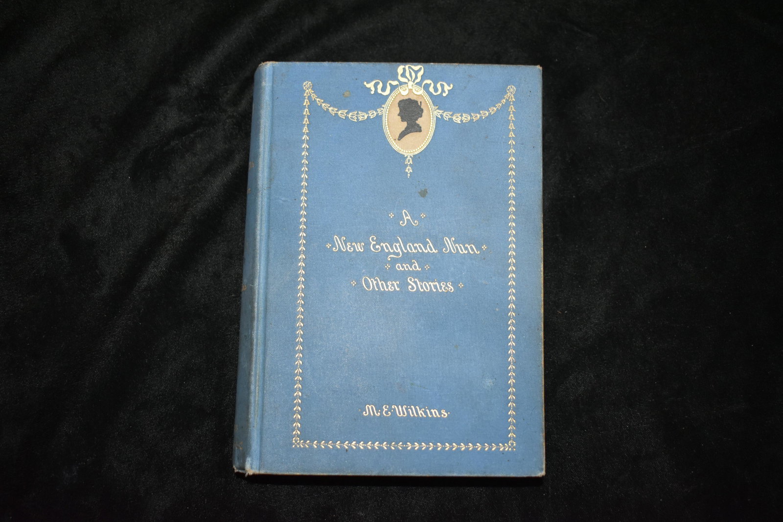 1891 A New England Nun 1st Ed: 1891 A New England Nun and Other Stories by Mary E. Wilkins. Published by Harper & Brothers, 1891. 1st Edition. Very Good + Condition. Little shelf wear to corners. 468 pgs plus ads. 6 7/8" by 5 1/4"