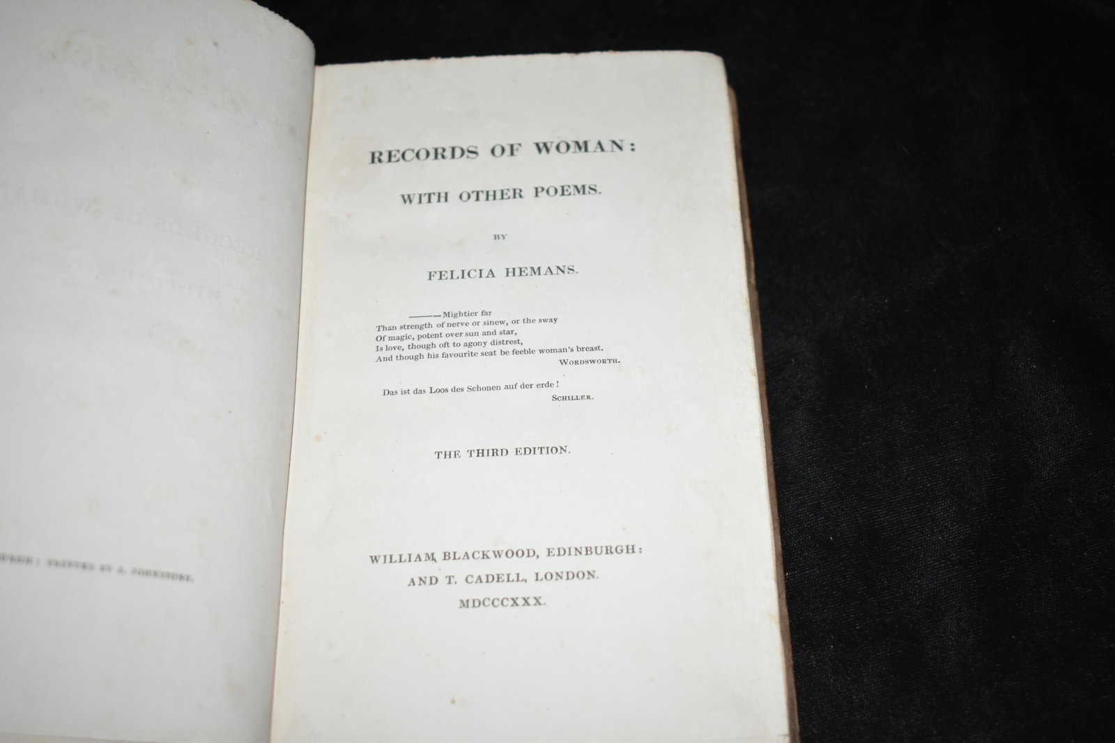 1830 Records of Woman: With Other Poems: Records of Woman: With Other Poems by Felicia Hemans. Published by London, William Blackwood 1830. Publishers original boards with title plate to spine. Good condition. Wear to spine and rough cut pag