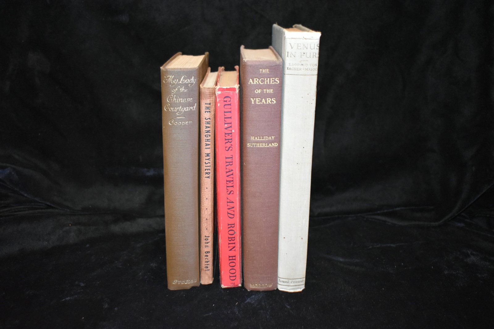 5 Antique Early 1900's Books: Venus in Furs by Leopold Von Sacher-Masoch 1928. Wear to corners and spine otherwise good condition.; The Arches of the Years by Halliday Sutherland 1933. Excellent condition.; Gulliver's Travels and 