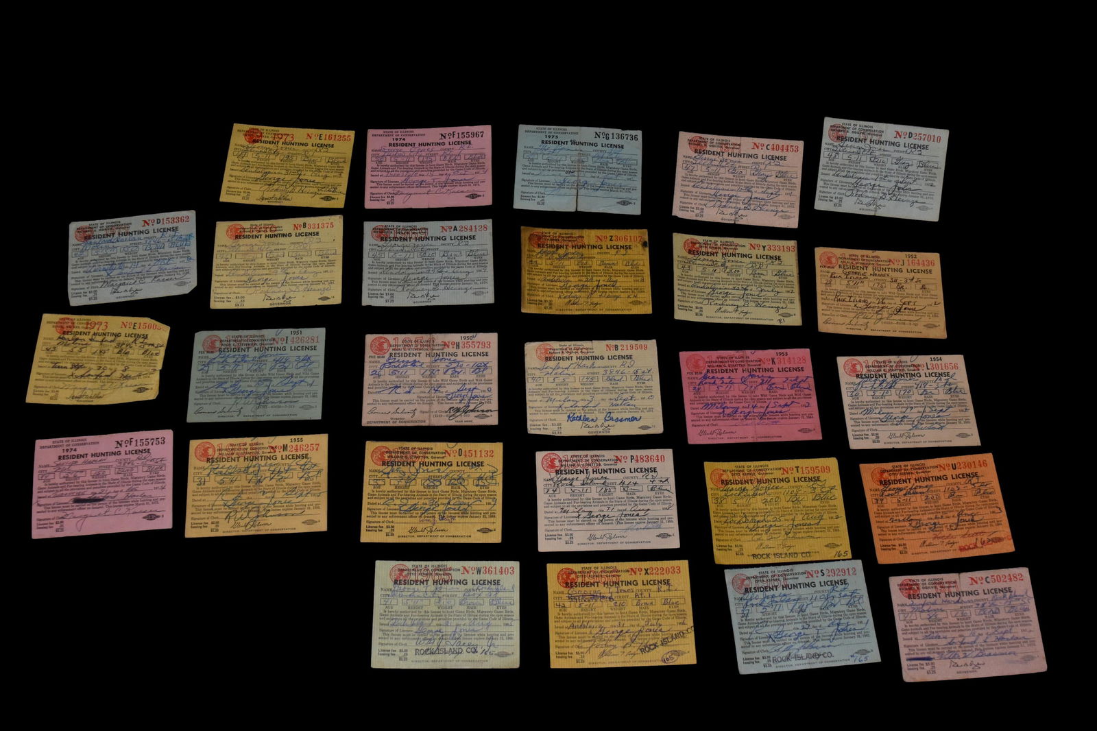 Collection of vintage duck hunting licenses with duck (1 of 2)