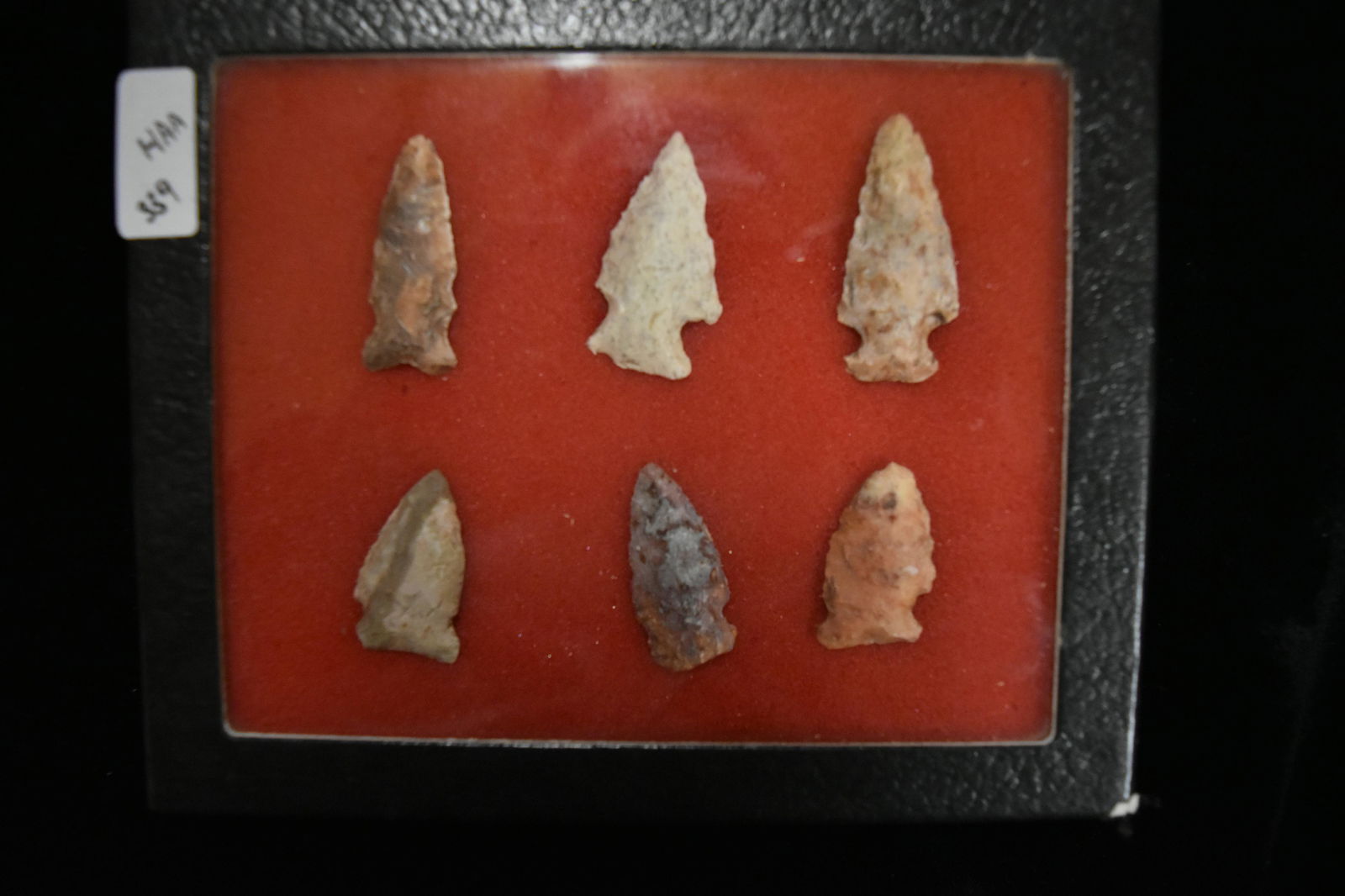 Frame containing 6 river stained Bird Points. This (1 of 2)