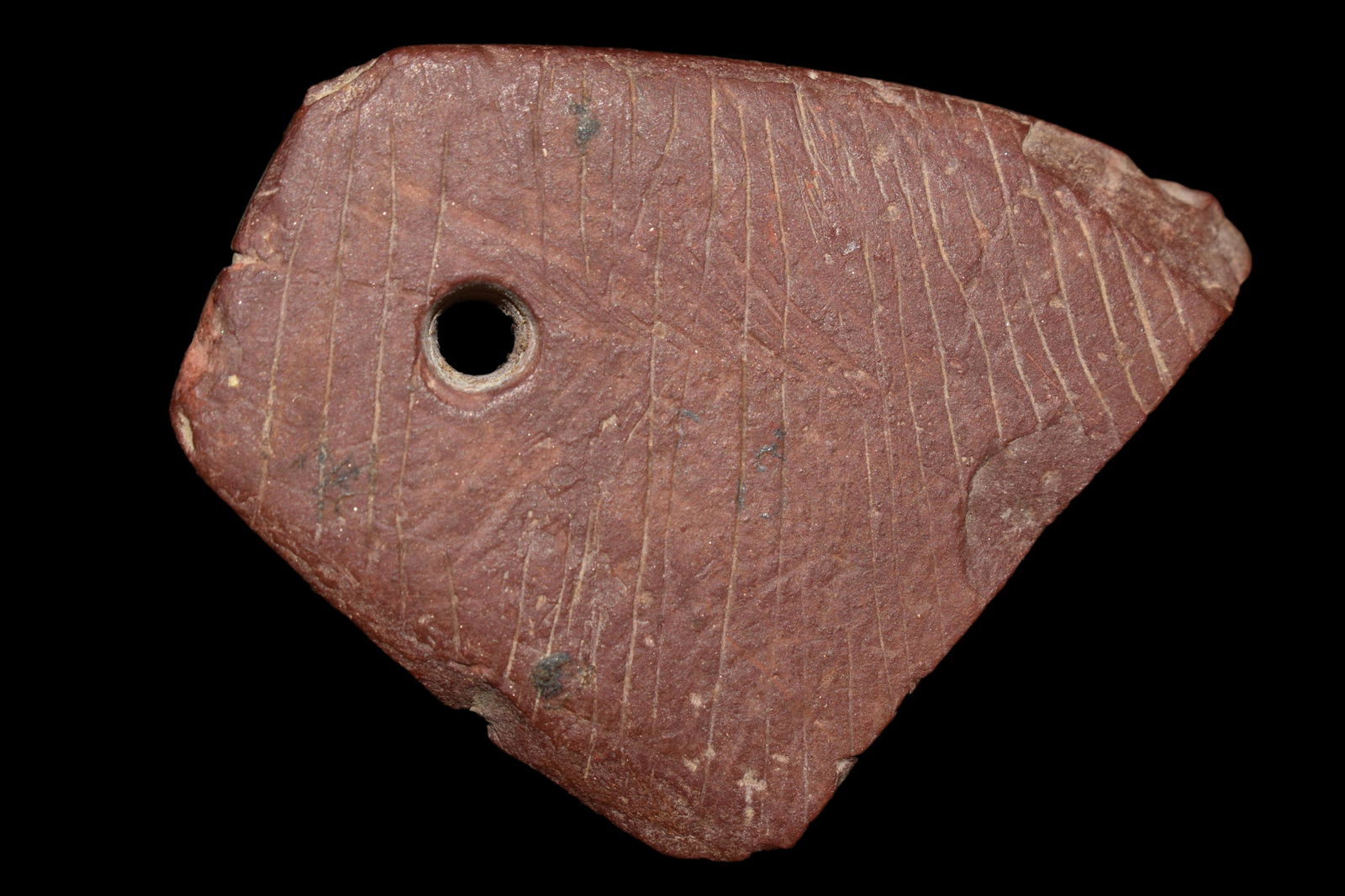 2" Heavily engraved clay stone pendant found in Brown (1 of 5)