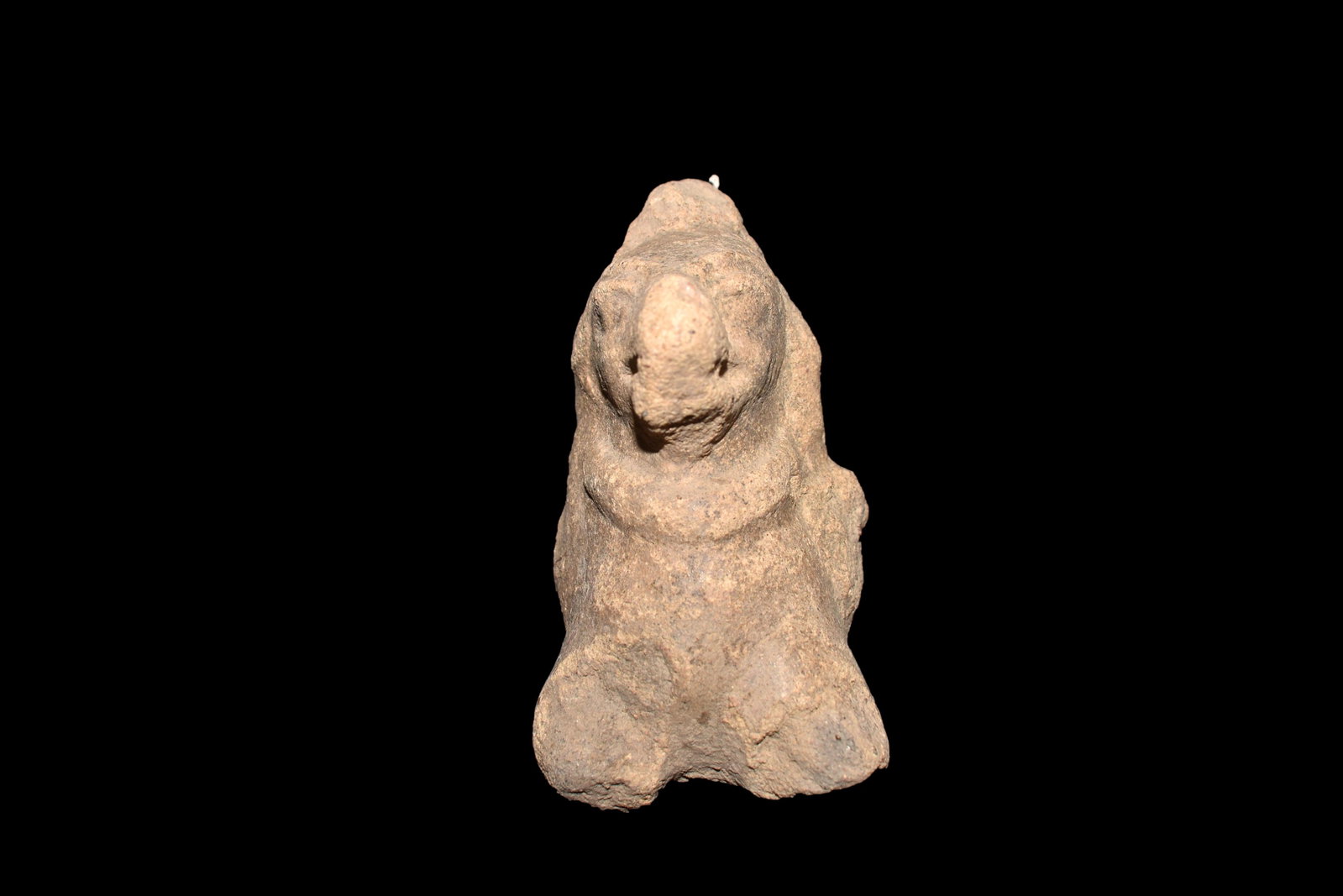 Maya Deity Figure: A fine Maya zoomorphic deity figure from Guatemala, ca. 400 â€“ 700 AD. It is 3-3/4” high and depicts the deity adorned with a necklace. Strong mineral deposits.