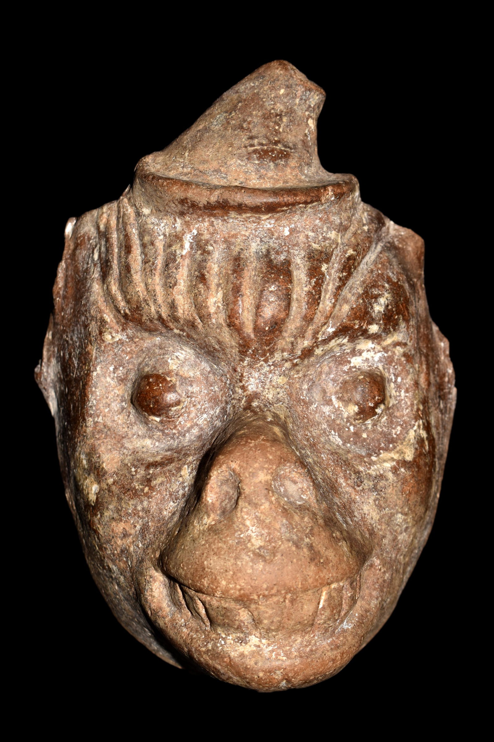 Mayan Monkey Deity Mask from Mexico, ca. 800 â€“ 1250: An excellent Maya mask from Mexico, ca. 800 â€“ 1250 AD. This beautifully detailed Post-Classic example is 7-1/2” high and portrays one of the monkey deities wearing a small hat.Rows of tee