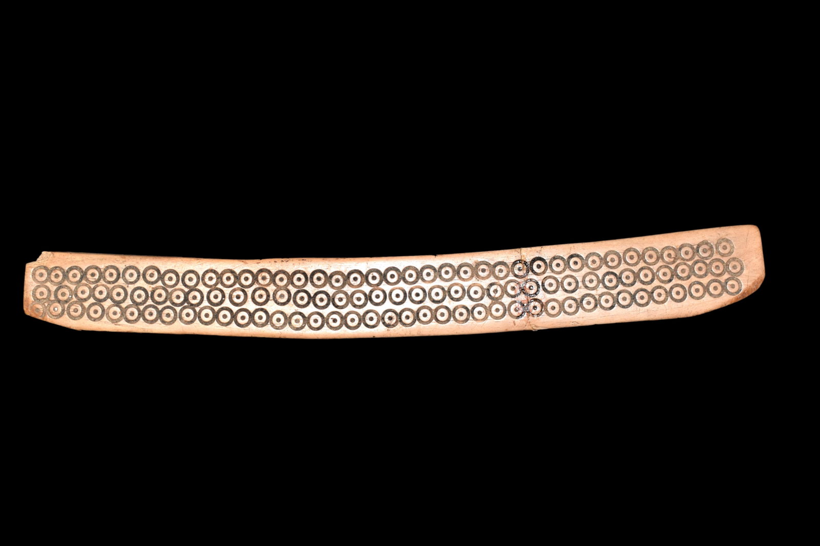 Nazca Bone Balance Beam from Peru, ca. 100-700AD: A rare Nazca bone balance beam from Peru, ca. 100 â€“ 700 AD. It was made for a small scale and is vertically perforated for attachment of dished. Beautifully decorated on both sides with intrica