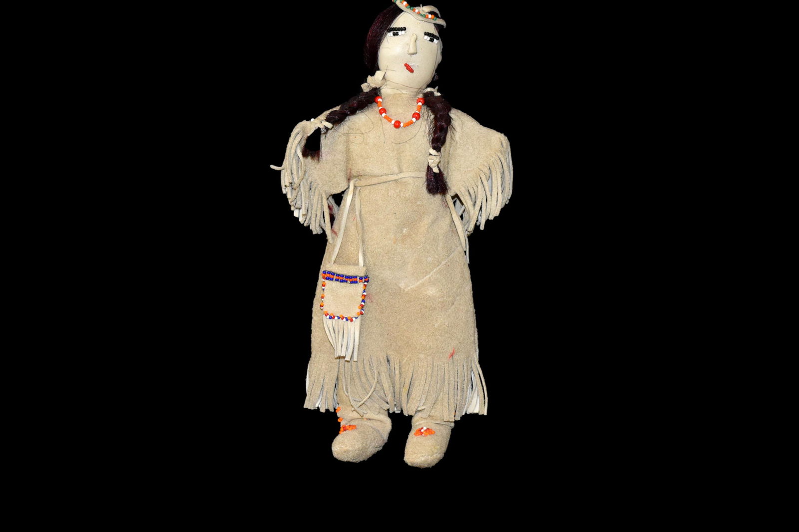 Sioux buckskin 12â€ doll; some beadwork from Pine (1 of 4)