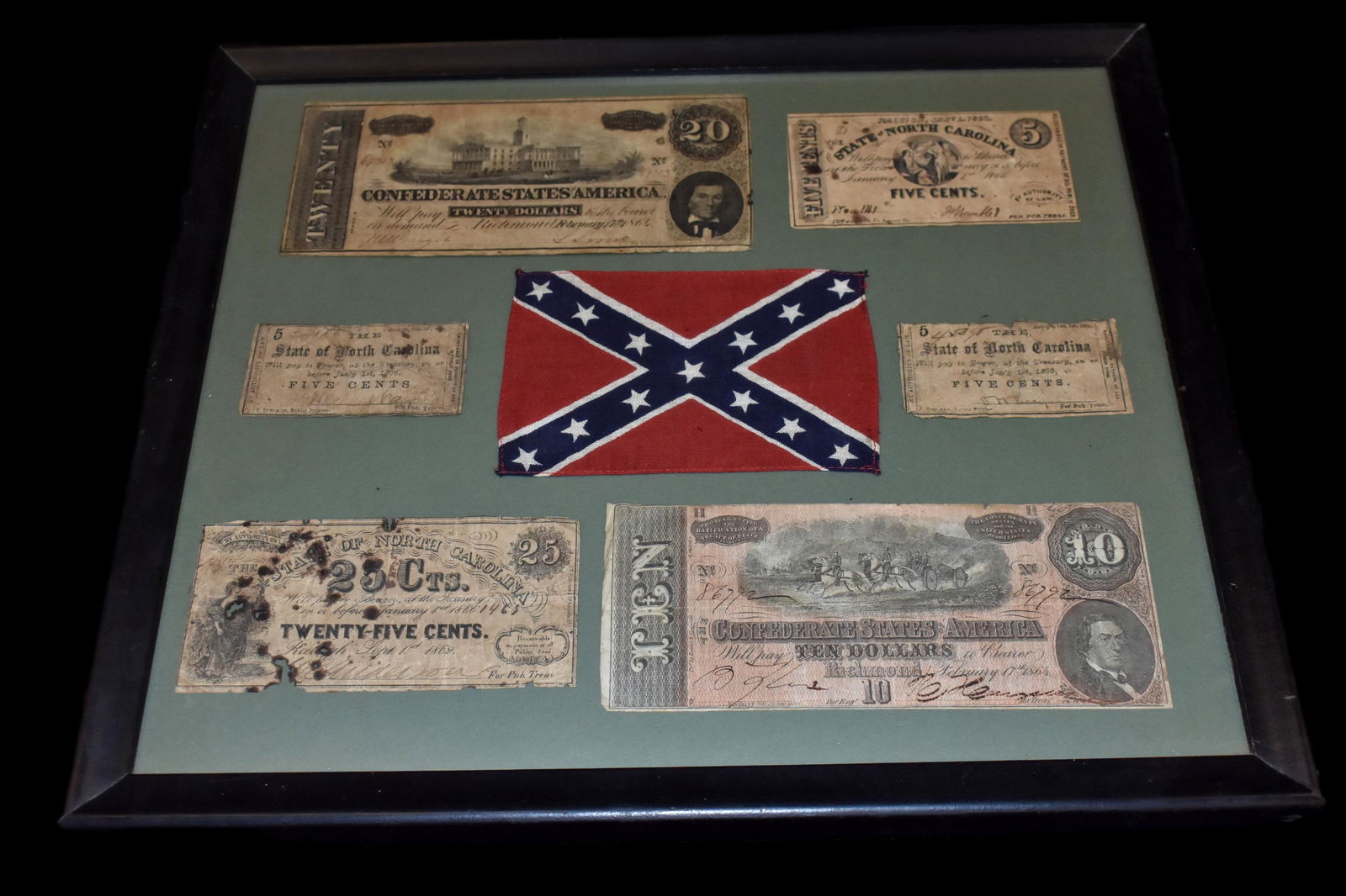 A frame containing 6 Confederate Curies. From the Civil (1 of 5)