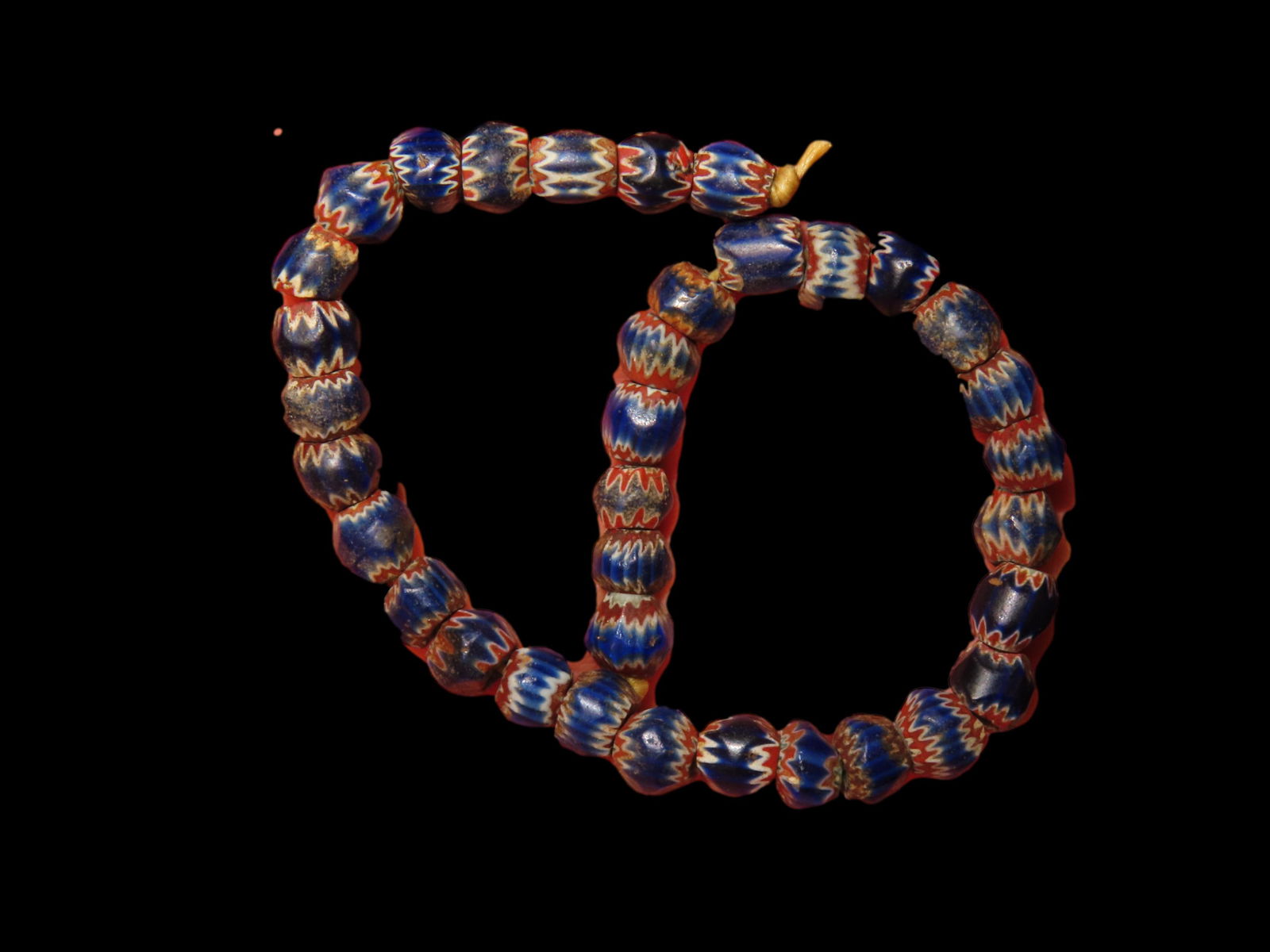 8 1/4" Strand of Chevron Style Tiny Dark Blue & Red Trade Beads  Ex Greg Perdun, Ex Mitch Lewis (1 of 3)